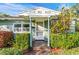 House entrance with columns and lush landscaping at 811 Briercliff Dr, Orlando, FL 32806