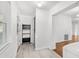 Small laundry area with shelving and exterior access at 811 Briercliff Dr, Orlando, FL 32806