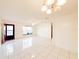 Living room with tile floors and ceiling fan at 95 Lake Villa Way, Kissimmee, FL 34743