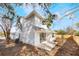 This backyard features a patio and minimal landscaping, with a focus on simplicity and functionality at 10632 Whitestone Ct, Orlando, FL 32817