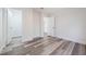 Bedroom with entryways and luxury vinyl plank flooring at 10632 Whitestone Ct, Orlando, FL 32817