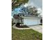 Charming single-Gathering home with a well-maintained front yard and two car garage at 10632 Whitestone Ct, Orlando, FL 32817