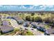 Aerial view of homes and community features near golf course at 11237 Amber Ridge Dr, Zellwood, FL 32798