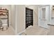 Main bathroom with shower, toilet and storage at 11237 Amber Ridge Dr, Zellwood, FL 32798