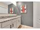 Double vanity bathroom with granite countertop at 11237 Amber Ridge Dr, Zellwood, FL 32798