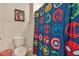 Bathroom with superhero themed shower curtain at 11237 Amber Ridge Dr, Zellwood, FL 32798