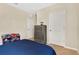 Bright bedroom with double bed, dresser, and ample closet space at 11237 Amber Ridge Dr, Zellwood, FL 32798