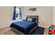 Cozy bedroom with a comfortable double bed and window coverings at 11237 Amber Ridge Dr, Zellwood, FL 32798