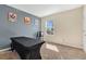 Multi-purpose bedroom with a desk and window at 11237 Amber Ridge Dr, Zellwood, FL 32798