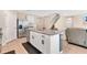 Modern kitchen with stainless steel appliances and granite countertops at 11237 Amber Ridge Dr, Zellwood, FL 32798