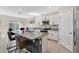 Kitchen with granite countertops and white cabinets at 11237 Amber Ridge Dr, Zellwood, FL 32798