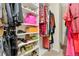 Large walk-in closet with ample shelving and hanging space at 11237 Amber Ridge Dr, Zellwood, FL 32798
