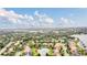 Aerial view of a home near a lake in a residential area at 1610 Conway Isle Cir, Belle Isle, FL 32809
