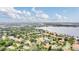 Wide shot of lakefront community, showcasing many homes at 1610 Conway Isle Cir, Belle Isle, FL 32809