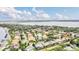Community overview with lake access and many homes at 1610 Conway Isle Cir, Belle Isle, FL 32809