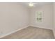 Well-lit bedroom with neutral colored walls and carpet at 1610 Conway Isle Cir, Belle Isle, FL 32809