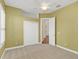 Cozy bedroom with light walls, double door closet and hardwood floors at 1610 Conway Isle Cir, Belle Isle, FL 32809