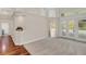 Bright Gathering room with hardwood and carpet flooring, and access to the pool at 1610 Conway Isle Cir, Belle Isle, FL 32809