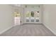 Gathering room with french doors opening to a pool and patio area at 1610 Conway Isle Cir, Belle Isle, FL 32809