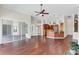 Gathering room with hardwood floors and kitchen views at 1610 Conway Isle Cir, Belle Isle, FL 32809