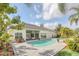 Private backyard oasis with a large pool and patio at 1610 Conway Isle Cir, Belle Isle, FL 32809