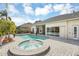 Spacious pool and spa with ample patio space at 1610 Conway Isle Cir, Belle Isle, FL 32809
