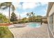 Large pool and spa with surrounding landscaping at 1610 Conway Isle Cir, Belle Isle, FL 32809