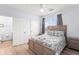 Bedroom with a queen bed and access to bathroom at 3175 Feltrim Pl # 305, Kissimmee, FL 34747