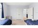 Bedroom with two twin beds, and access to another room at 3175 Feltrim Pl # 305, Kissimmee, FL 34747