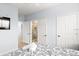 Bedroom with queen bed and ensuite bathroom at 3175 Feltrim Pl # 305, Kissimmee, FL 34747