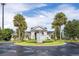 Attractive community entrance with fountain and landscaping at 3175 Feltrim Pl # 305, Kissimmee, FL 34747