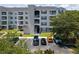 Three-story apartment building with parking and landscaping at 3175 Feltrim Pl # 305, Kissimmee, FL 34747