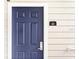 Private condo entrance with modern door at 3175 Feltrim Pl # 305, Kissimmee, FL 34747