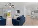 Living room with two sofas and access to a balcony at 3175 Feltrim Pl # 305, Kissimmee, FL 34747