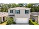 Two-story house with gray siding, white garage door, and blue shutters from above at 368 Pelham Park Dr, Deland, FL 32720