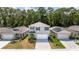 Two-story house with gray siding, white garage door, and blue shutters from above at 368 Pelham Park Dr, Deland, FL 32720