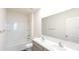 Clean bathroom with double vanity and shower/tub combo at 368 Pelham Park Dr, Deland, FL 32720