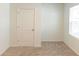 Simple bedroom with neutral walls and carpet at 368 Pelham Park Dr, Deland, FL 32720