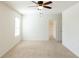 Spacious bedroom with ceiling fan and closet at 368 Pelham Park Dr, Deland, FL 32720