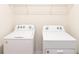 Laundry room with Whirlpool washer and dryer at 368 Pelham Park Dr, Deland, FL 32720