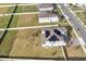 House with solar panels and a large backyard with a playground at 4360 Sunset Preserve Blvd, Orlando, FL 32820