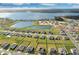 Aerial view of houses and lake at 4360 Sunset Preserve Blvd, Orlando, FL 32820