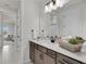 Bright bathroom with a modern vanity and shower at 4360 Sunset Preserve Blvd, Orlando, FL 32820