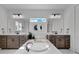Bathroom with soaking tub and double vanity at 4360 Sunset Preserve Blvd, Orlando, FL 32820