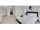 Bright bedroom with a queen bed, ensuite bathroom access, and a view at 4360 Sunset Preserve Blvd, Orlando, FL 32820