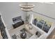 Bright living room with vaulted ceiling and large windows at 4360 Sunset Preserve Blvd, Orlando, FL 32820