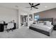 Main bedroom with sitting area and large windows at 4360 Sunset Preserve Blvd, Orlando, FL 32820