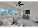 Main bedroom with large windows and modern dresser at 4360 Sunset Preserve Blvd, Orlando, FL 32820