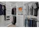 Spacious walk-in closet with ample shelving and hanging space at 4360 Sunset Preserve Blvd, Orlando, FL 32820
