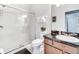 Simple bathroom with a walk-in shower and modern fixtures at 4973 Pall Mall W St, Kissimmee, FL 34758